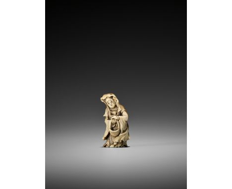   A STAG ANTLER NETSUKE OF SEIOBO  Unsigned  Japan, early 19th century, Edo period (1615-1868)    Carved as Seiobo wearing a 