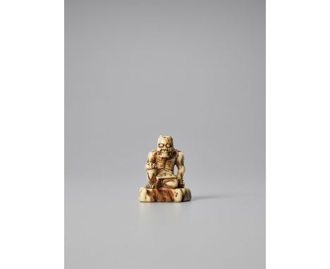   AN OLD IVORY NETSUKE OF AN ONI  Unsigned  Japan, 17th century, Edo period (1615-1868)    This old and worn ivory netsuke sh