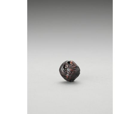   A WOOD RYUSA MANJU NETSUKE OF A HOHO BIRD  Unsigned  Japan, 19th century    The legendary bird with finely incised plumage 
