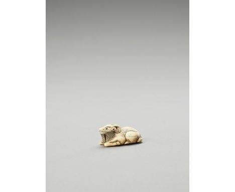   AN IVORY NETSUKE OF A RECUMBENT GOAT  Unsigned  Japan, 19th century, Edo period (1615-1868)    The goat with legs neatly po