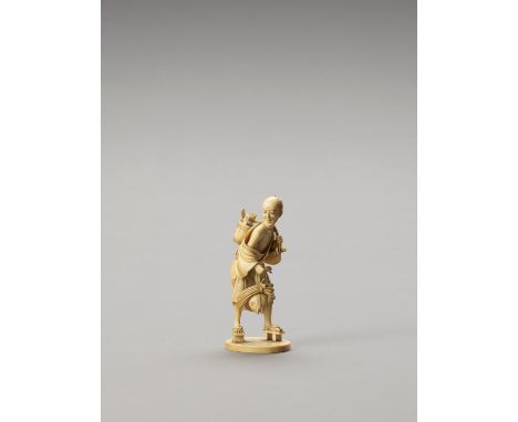   AN IVORY NETSUKE OF A FISHERMAN WITH A FISH HEAD  Japan, Meiji period (1868-1912)    The man wearing a simple robe and geta