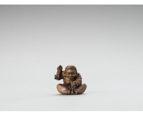   A FINE OKIMONO-NETSUKE OF DAIKOKU CARVING A RAT  In the manner of Suzuki Tokoku, unsigned  Japan, Tokyo, Meiji period (1868