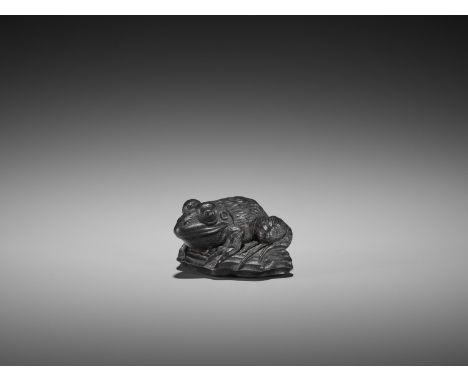   AN IMPORTANT EBONY WOOD NETSUKE OF A FROG ON DRIFTWOOD ATTRIBUTED TO SEIYODO TOMIHARU  Attributed to Seiyodo Tomiharu, unsi