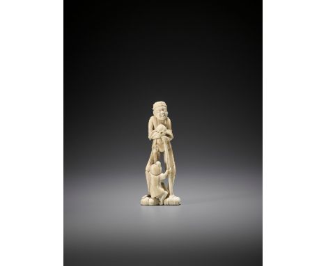   A TALL WALRUS IVORY NETSUKE OF A SARUMAWASHI  Unsigned  Japan, late 18th to early 19th century, Edo period (1615-1868)    A