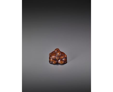   A WOOD NETSUKE OF TWO WRESTLERS  Unsigned  Japan, early 19th century, Edo period (1615-1868)    Carved from cherry wood and