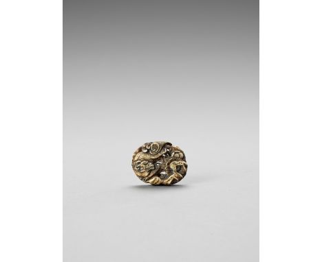   A STAINED IVORY ‘IMITATION STAG ANTLER’ RYUSA MANJU NETSUKE OF A SHISHI AND PEONY  Unsigned  Japan, Tokyo, late 19th centur