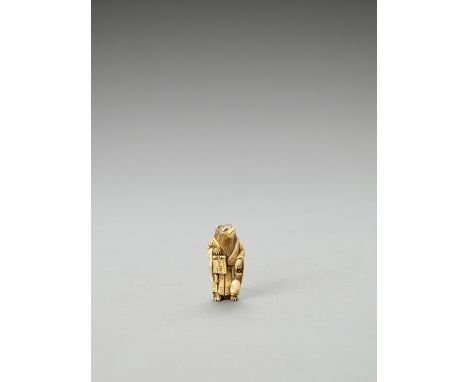   AN IVORY NETSUKE OF A TANUKI AS A SAKE VENDOR  Unsigned  Japan, Meiji period (1868-1912)    The clothed tanuki is standing 