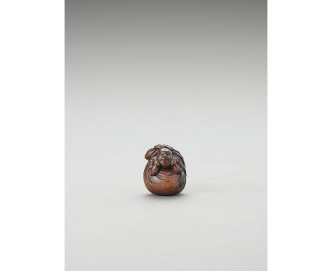   A WOOD NETSUKE OF HOTEI INSIDE HIS SACK  Unsigned  Japan, 19th century, Edo period (1615-1868)    The netsuke of almost sph