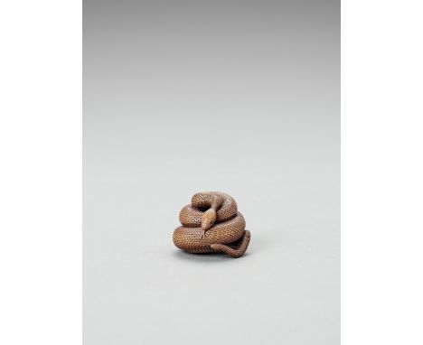   A CONTEMPORARY WOOD NETSUKE OF A COILED SNAKE AFTER MATSUDA SUKENAGA  By contemporary artist Vadym Pyvovar    Finely carved