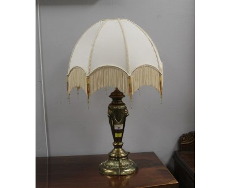 Decorative table lamp and shade with brass effect base