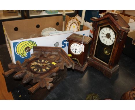 Cuckoo clock and two mantle clocks
