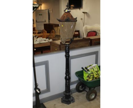 Cast iron floor standing lantern, height 180 cm 