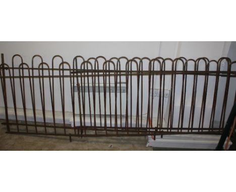Three sections of metal railing, longest 270 cm  
