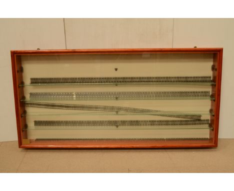 A Picture Pride Displays 00 HO or TT Gauge wall mounted front opening Display Cabinet, constructed in varnished light wood wi