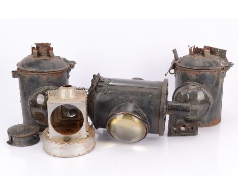 Three Railway Signal Lamps or similar, all with heavy glass 'fisheye' lenses, one with heavy cast mounting bracket and with c