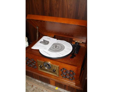 A MODERN COMBINATION CD/ RECORD PLAYER 