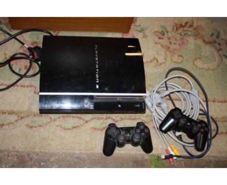 A PS3 CONSOLE AND CONTROLLERS