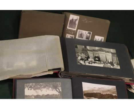 A COLLECTION OF VINTAGE BLACK AND WHITE PHOTOGRAPHS BOTH LOOSE AND IN ALBUMS 