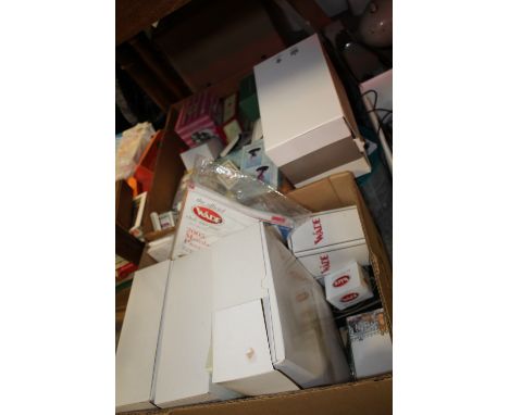 A LARGE QUANTITY OF EMPTY WADE BOXES AND MAGAZINES