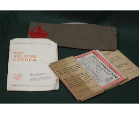A SMALL QUANTITY OF WARTIME EPHEMERA TO INCLUDE RATION BOOKS, WAR GARDENING LEAFLET ETC. 