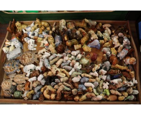 A TWIN HANDLED TRAY OF WADE FIGURES AND WHIMSIES