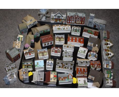 A COLLECTION OF WADE BUILDING FIGURES