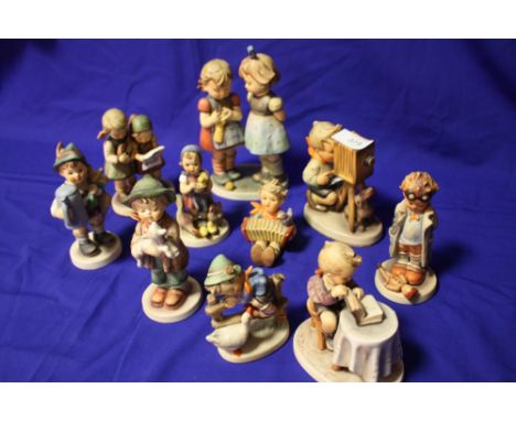 A COLLECTION OF GOEBEL AND HUMMEL FIGURES OF ASSORTED SIZES (10)