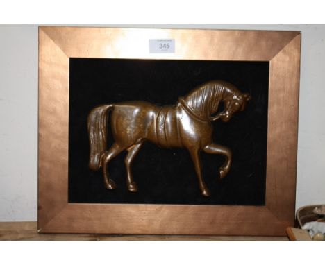 A BRONZE TYPE WALL MOUNTABLE PLAQUE OF A HORSE