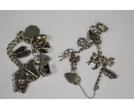 TWO VINTAGE SILVER CHARM BRACELETS 