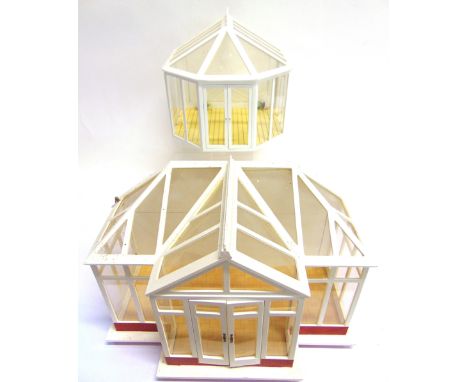 TWO 1/12 SCALE DOLL'S HOUSE CONSERVATORIES  together with a quantity of garden accessories, some in original packaging.