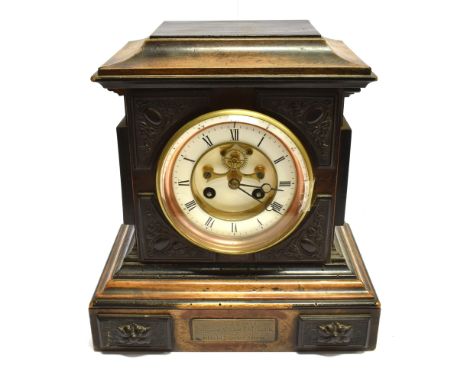 A VICTORIAN WALNUT MANTLE CLOCK  with visible escapement, the French 8 day movement striking on a coiled gong, 23cm wide 24cm