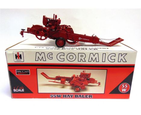 A 1/16 SCALE SPEC CAST RESIN MCCORMICK 55W HAY BALER  boxed.