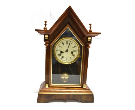 A FAUX ROSEWOOD CASED MANTLE CLOCK  the 8-day movement striking on a gong, paper label to back for Union Clock Company, 25cm 