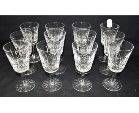 A SET OF TWELVE WATERFORD CRYSTAL 'LISMORE' PATTERN WHITE WINE GLASSES 14cm high