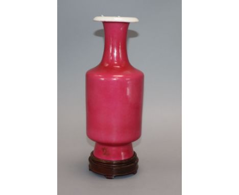 A Chinese ruby glazed vase, Juren tang mark, Republic period, H. 22.5cm, wood standProvenance - The present owner lived and w