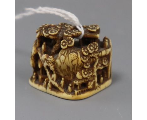 A carved ivory japanese netsuke