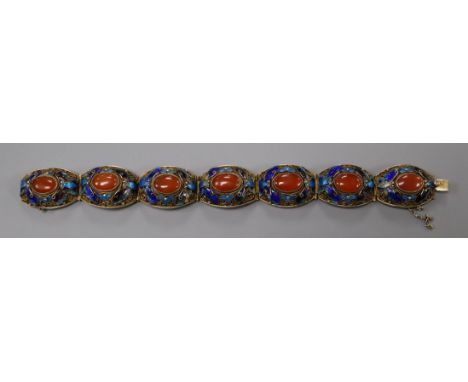 A Chinese gilt white metal filligree, enamel and cabochon carnelian set bracelet, 18cm.