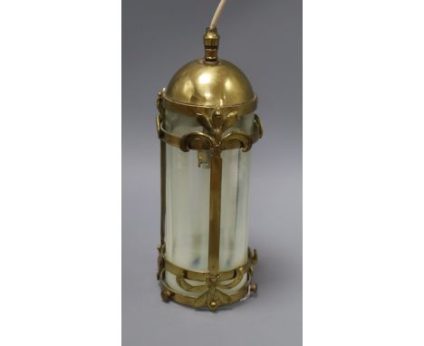 An Arts &amp; Crafts brass and vaseline glass lantern height approx. 32cm