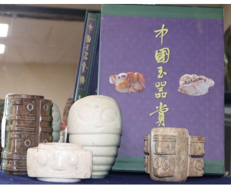 Three Chinese archaistic jade and hardstone cong and a white stone carving, and a Chinese language book on jade, editor Xue G