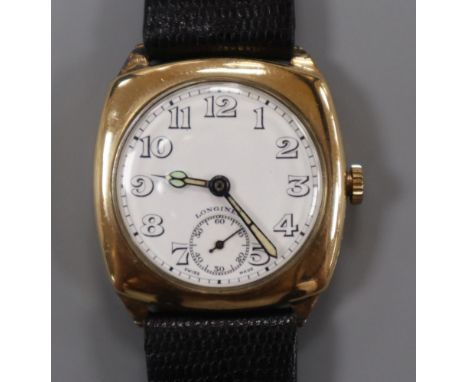 A gentleman's early 20th century 9ct gold Longines manual wind wrist watch, on later associated strap.