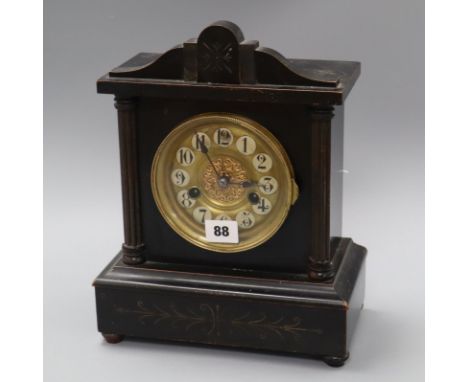 A German fourteen day lacquered mantel clock height 32cm
