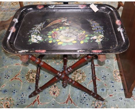 A Victorian toleware tray on turned folding stand W.77cm