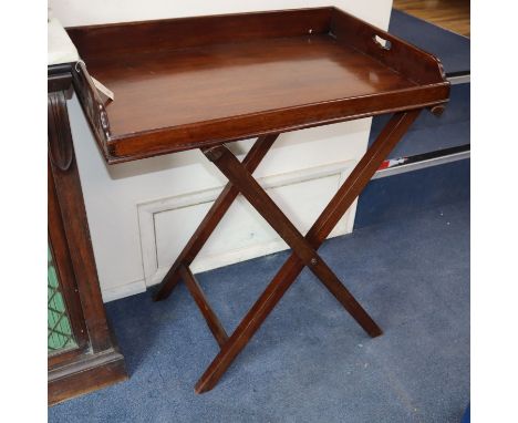 A Victorian mahogany butler's tray on folding stand W.77cm