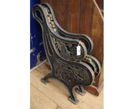 A pair of cast iron bench ends