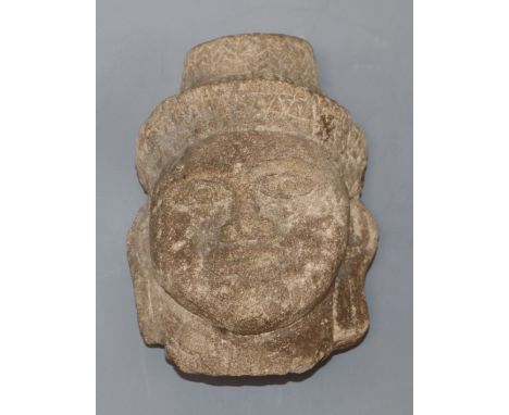 A 10 - 12th century Cambodian Khmer sandstone Buddha head height 15cm