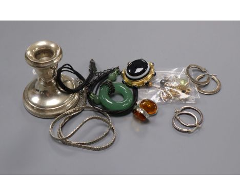 A Victorian yellow metal and banded agate brooch, mixed costume jewellery and a silver dwarf candlestick.