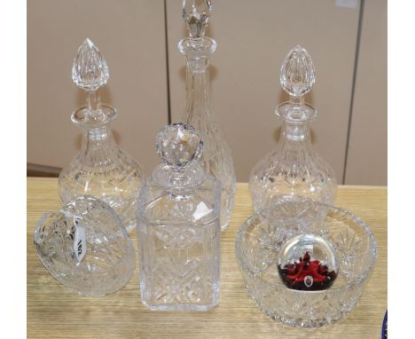 Four cut glass decanters, a Caithness paperweight, a bowl and a basket