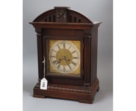 An oak mantel clock