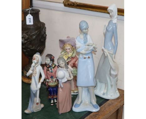 Six porcelain figures including Lladro
