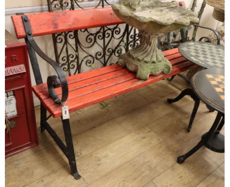 A painted slatted wrought iron garden bench Length 155cm